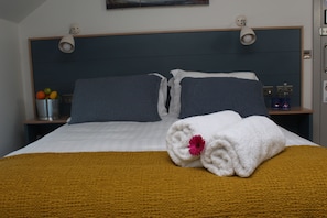 Ropa de cama de alta calidad y cortinas blackout