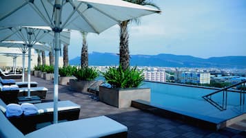 Outdoor pool, pool umbrellas, pool loungers