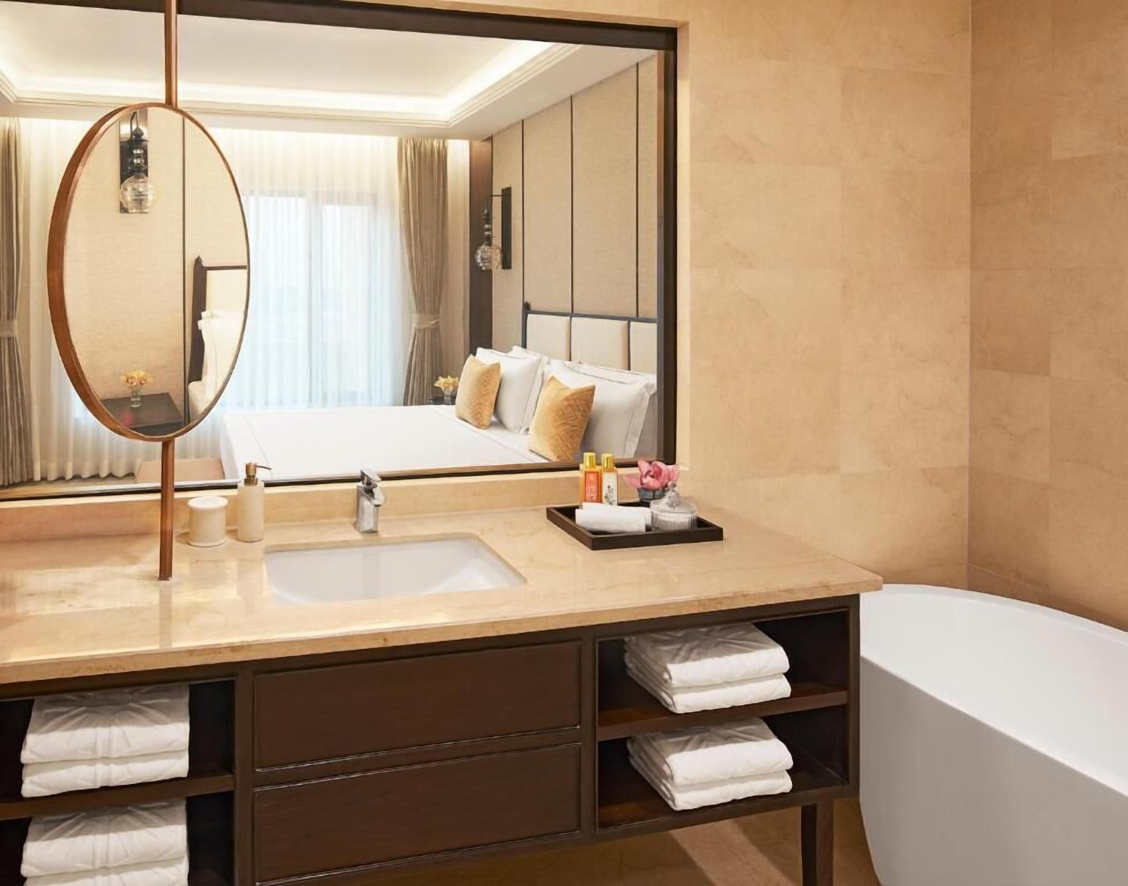 Bathroom | Rainfall showerhead, designer toiletries, hair dryer, bathrobes