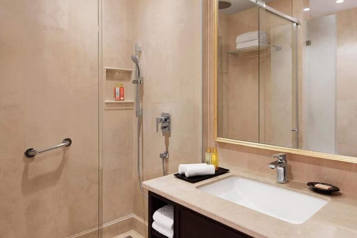 Bathroom | Rainfall showerhead, designer toiletries, hair dryer, bathrobes