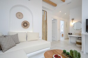 Apartment, 2 Bedrooms, Ground Floor | Living area | Flat-screen TV - Smirida Suites (Naxos)