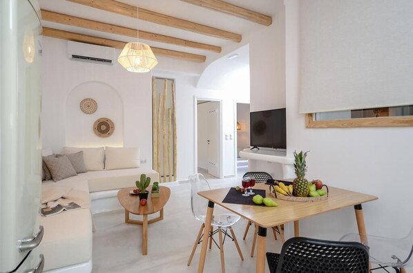 Apartment, 2 Bedrooms, Ground Floor | Living area | Flat-screen TV - Smirida Suites (Naxos)