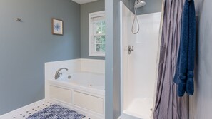 Shower, jetted tub, hair dryer, towels