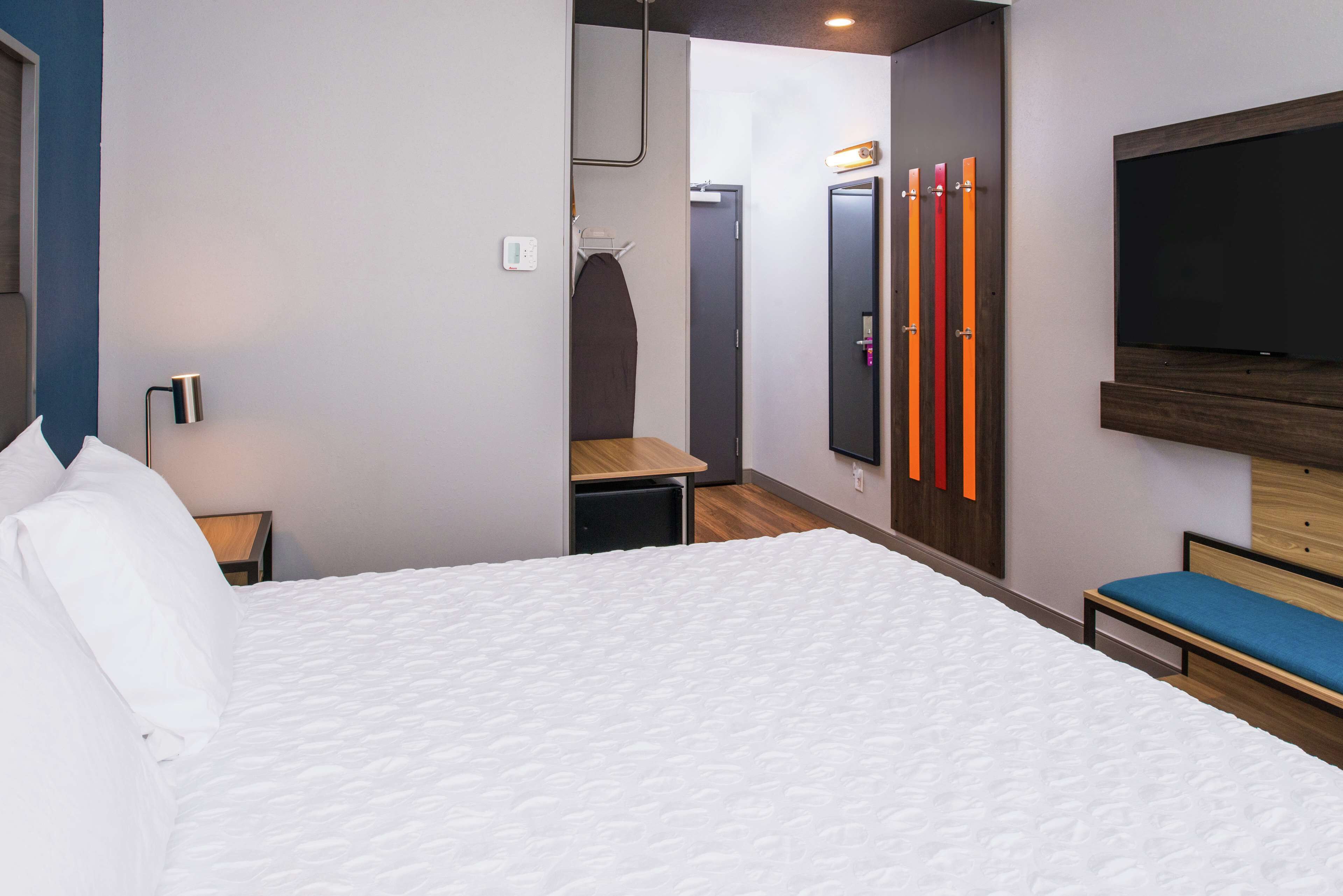 desk, laptop workspace, blackout curtains, iron/ironing board