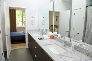 Bathtub, eco-friendly toiletries, hair dryer, bathrobes