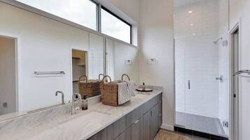 Bathtub, eco-friendly toiletries, hair dryer, bathrobes