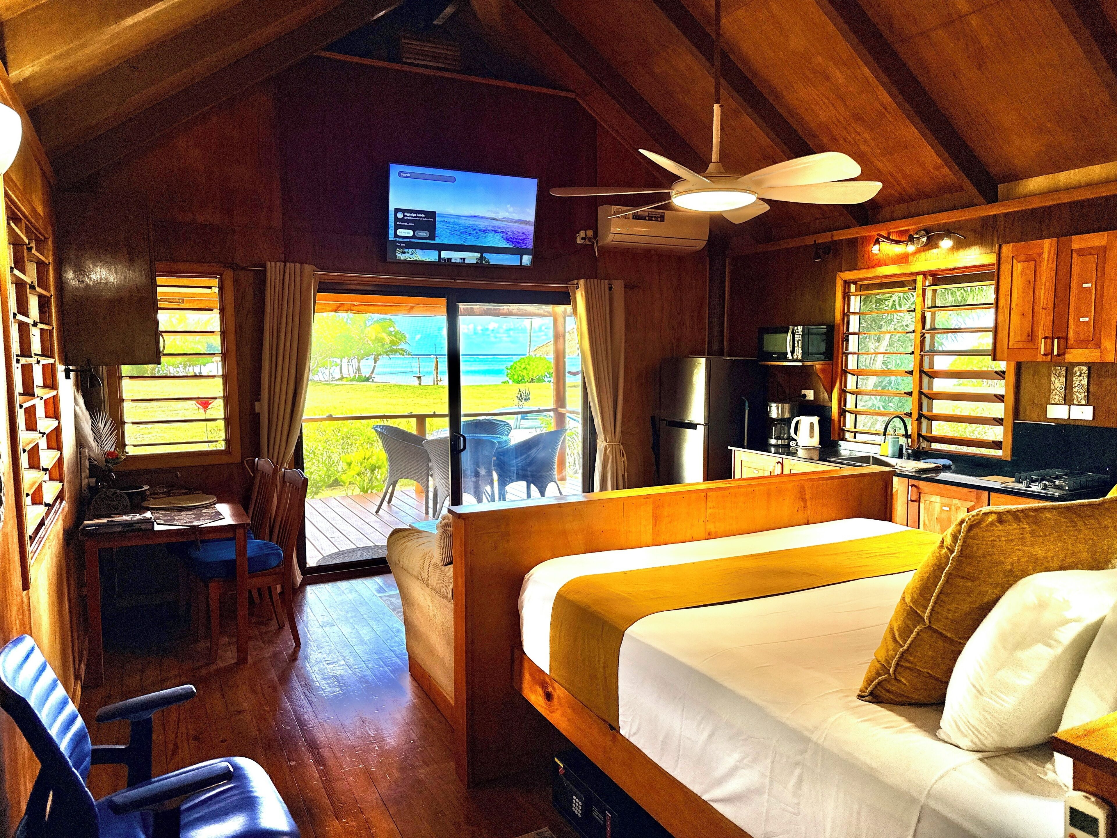 Panoramic Studio Suite, 1 King Bed, Kitchen, Beachfront | In-room safe, individually decorated, individually furnished