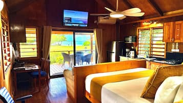 Panoramic Studio Suite, 1 King Bed, Kitchen, Beachfront | In-room safe, individually decorated, individually furnished