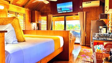 Panoramic Studio Suite, 1 King Bed, Kitchen, Beachfront | In-room safe, individually decorated, individually furnished