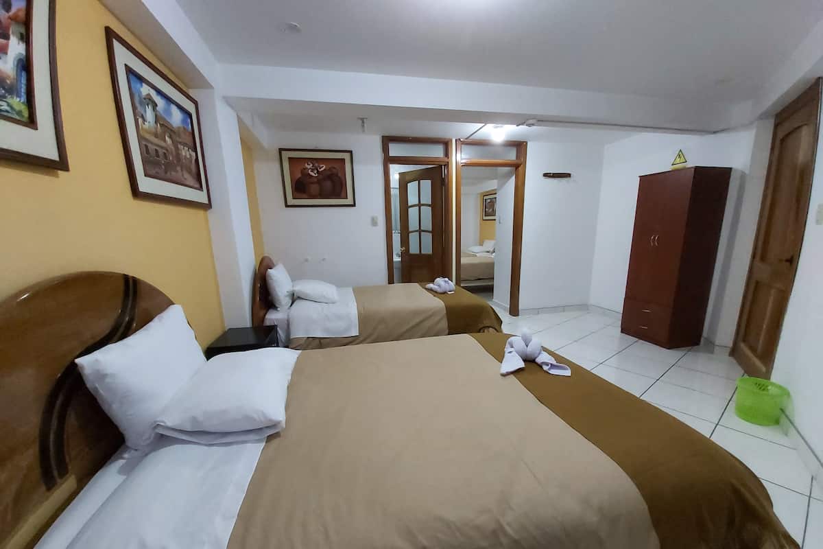 Standard Quadruple Room | Down comforters, laptop workspace, WiFi, bed sheets