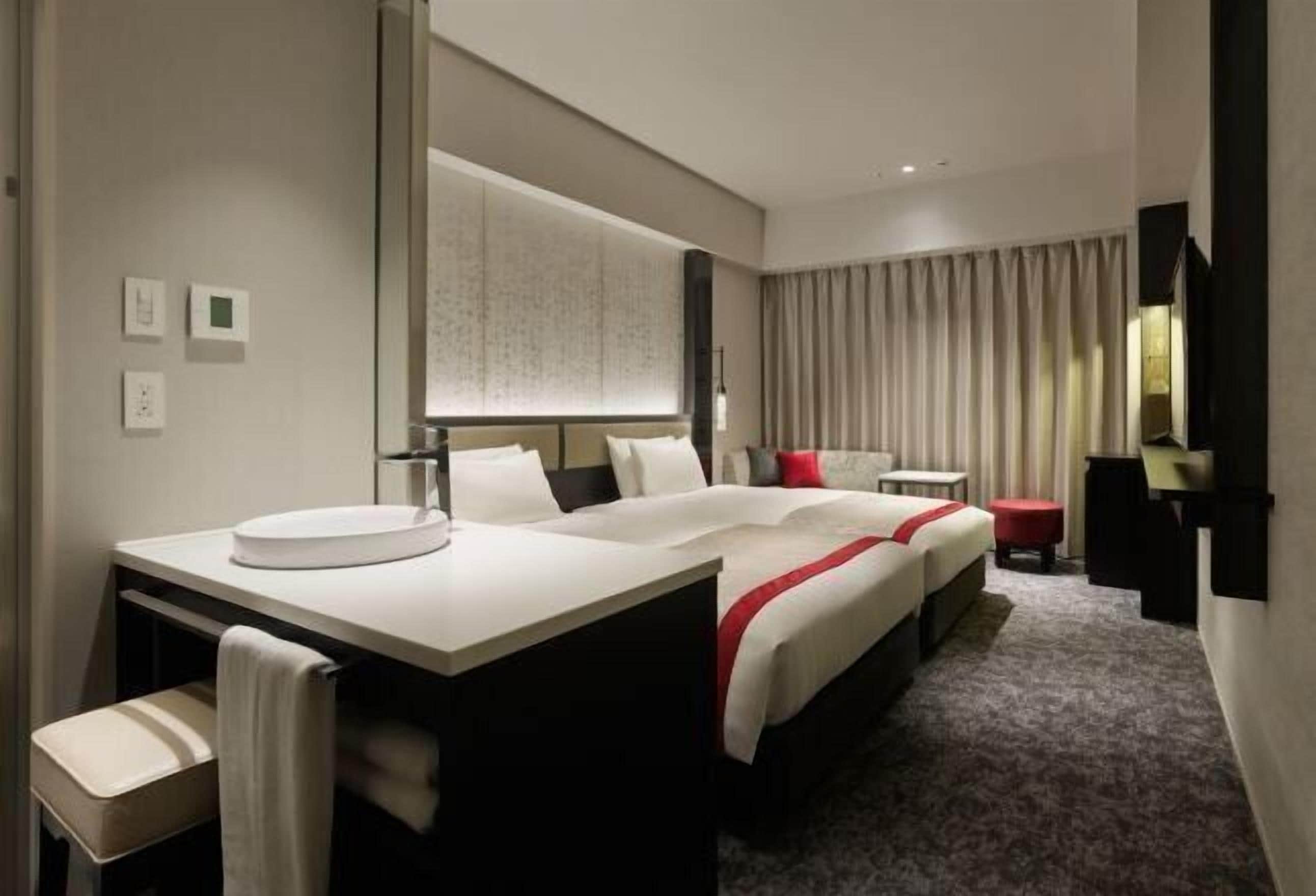 Coffres-forts dans les chambres, Wi-Fi gratuit, draps fournis