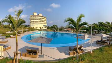 Seasonal outdoor pool, open 9:00 AM to 9:00 PM, pool umbrellas