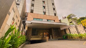 A modern hotel building with a prominent sign reading "HOTEL ALIA". - Alia Boutique Pasar Baru (Jakarta)