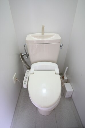 Separate bathtub and shower, free toiletries, hair dryer, slippers