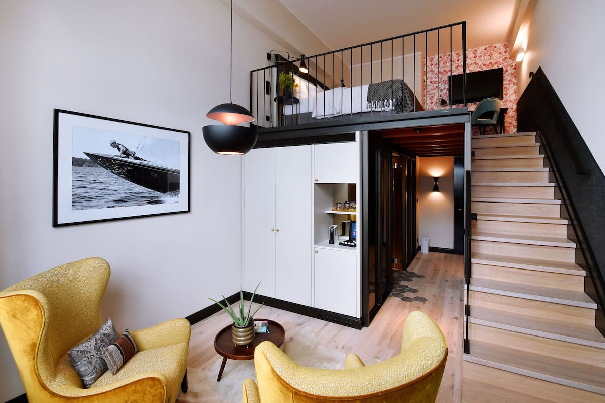 double room (loft harbour) | living area | lcd tv, tablet