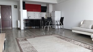 Deluxe Apartment | Living room | Flat-screen TV - Apartment 93 11th floor (Bucharest)