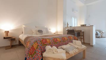 Neljän hengen deluxe-huone | Egyptinpuuvillaiset lakanat, ylelliset vuodevaatteet, untuvapeitot