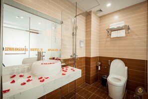Shower, hydromassage showerhead, bathrobes, slippers