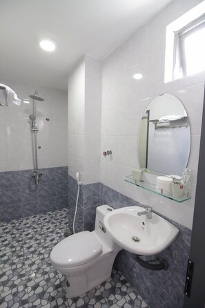 Shower, free toiletries, hair dryer, slippers