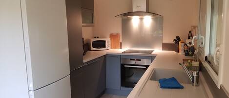 Microwave, coffee/tea maker, cookware/dishes/utensils