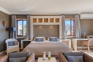 Habitación de lujo, 1 cama de matrimonio grande | Ropa de cama de alta calidad, minibar, decoración individual