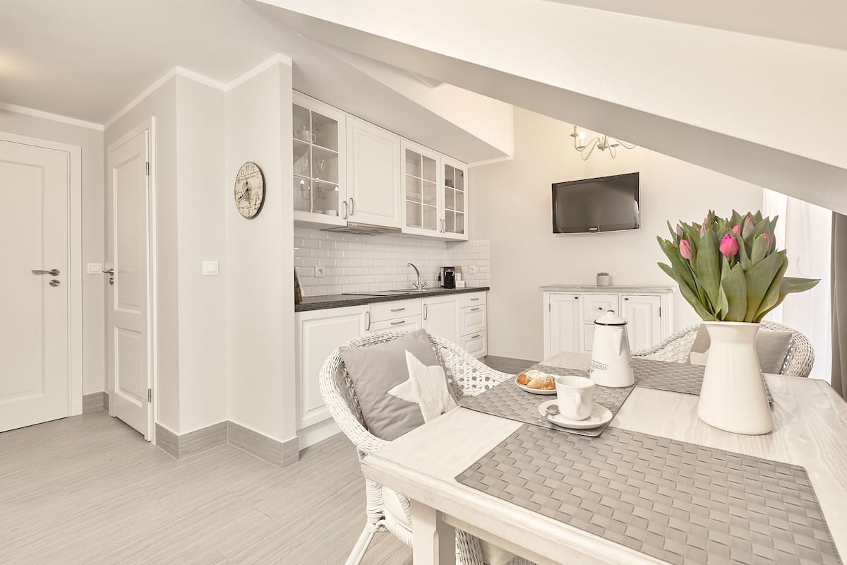 Apartment, Garden View, Mezzanine | Living area | Plasma TV