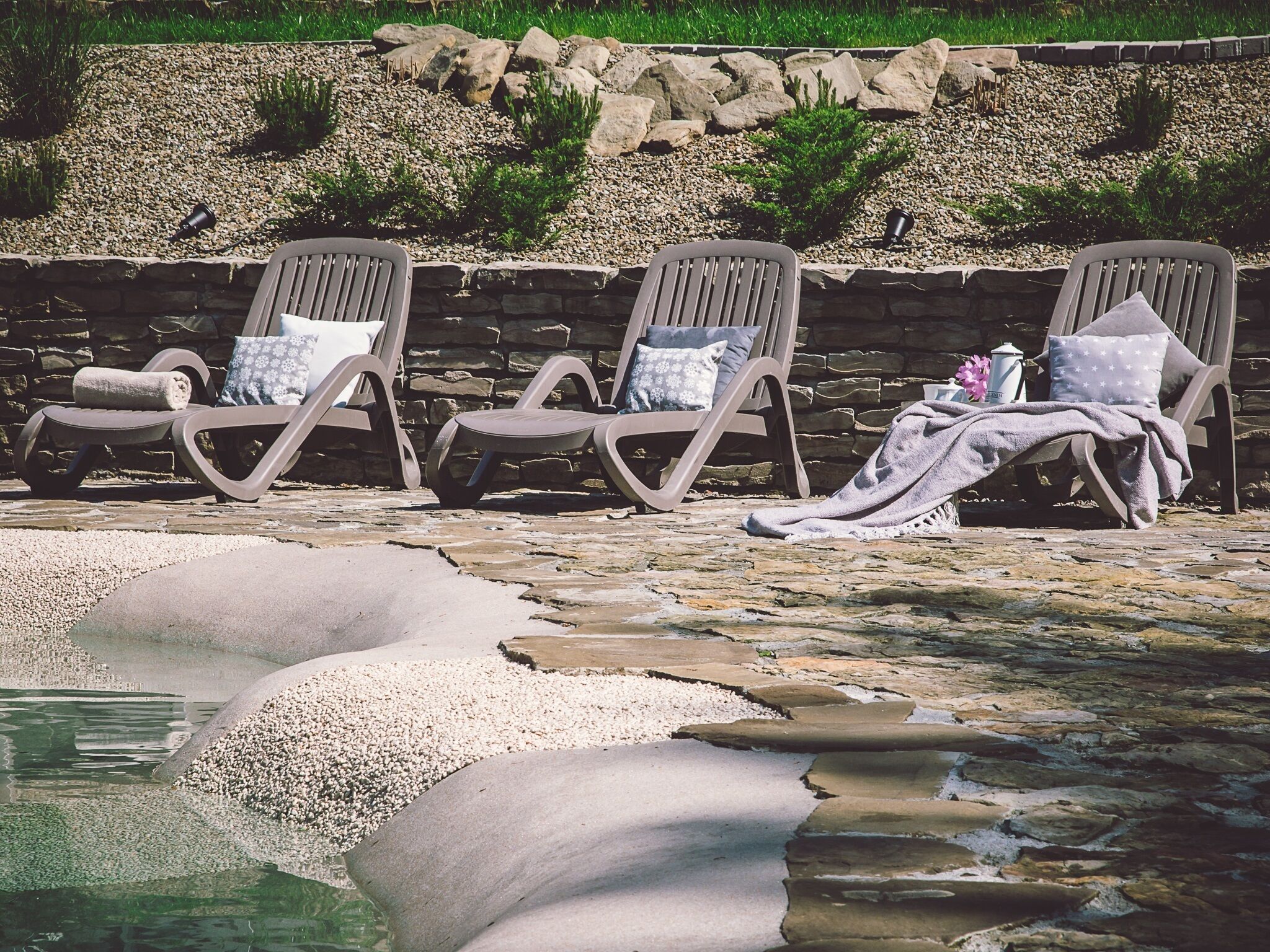 Seasonal outdoor pool, open 10:00 AM to 8:00 PM, sun loungers