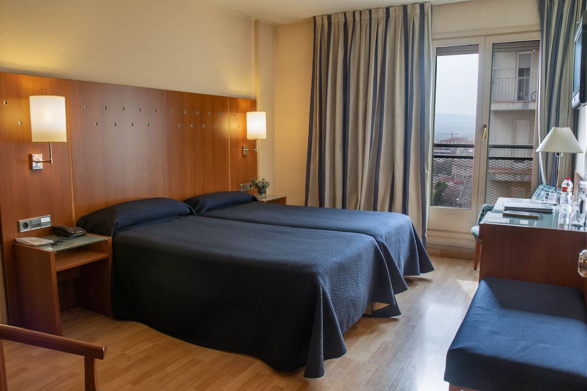 Desk, iron/ironing board, free WiFi, bed sheets