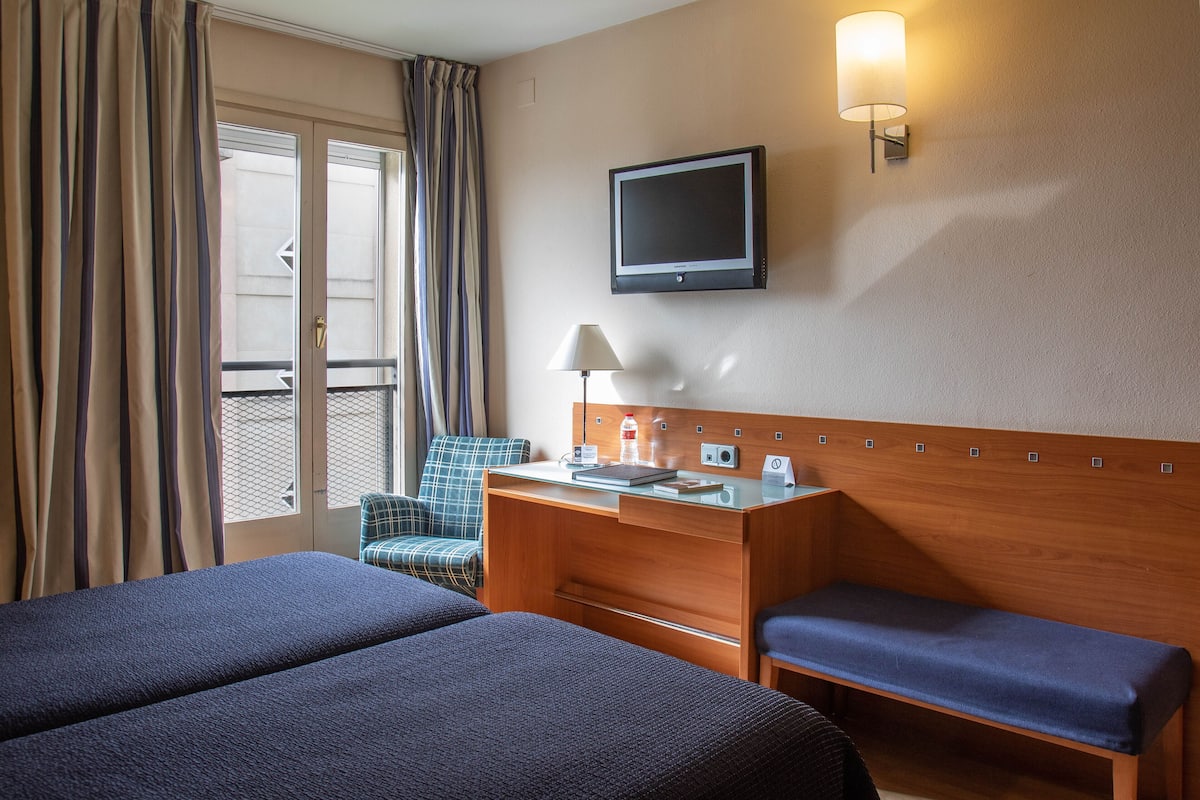 desk, iron/ironing board, free wifi, bed sheets