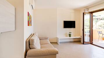 Apartemen, 1 kamar tidur | Area keluarga | TV layar datar