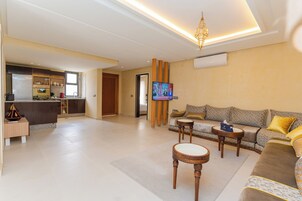 Apartment AGLOU (Ground floor) | Living area | 65-inch Smart TV with satellite channels
