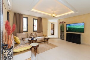 Apartment LGZIRA (First floor) | Living area | 65-inch Smart TV with satellite channels