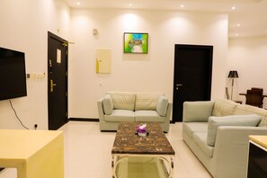 Family Apartment | Living room | Flat-screen TV
