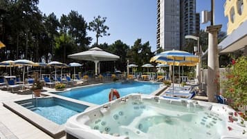 Outdoor pool, pool umbrellas, sun loungers