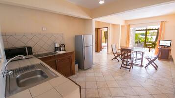 Seafront 2 Bedrooms Apartment | Private kitchen | Full-sized fridge, microwave, stovetop, coffee/tea maker