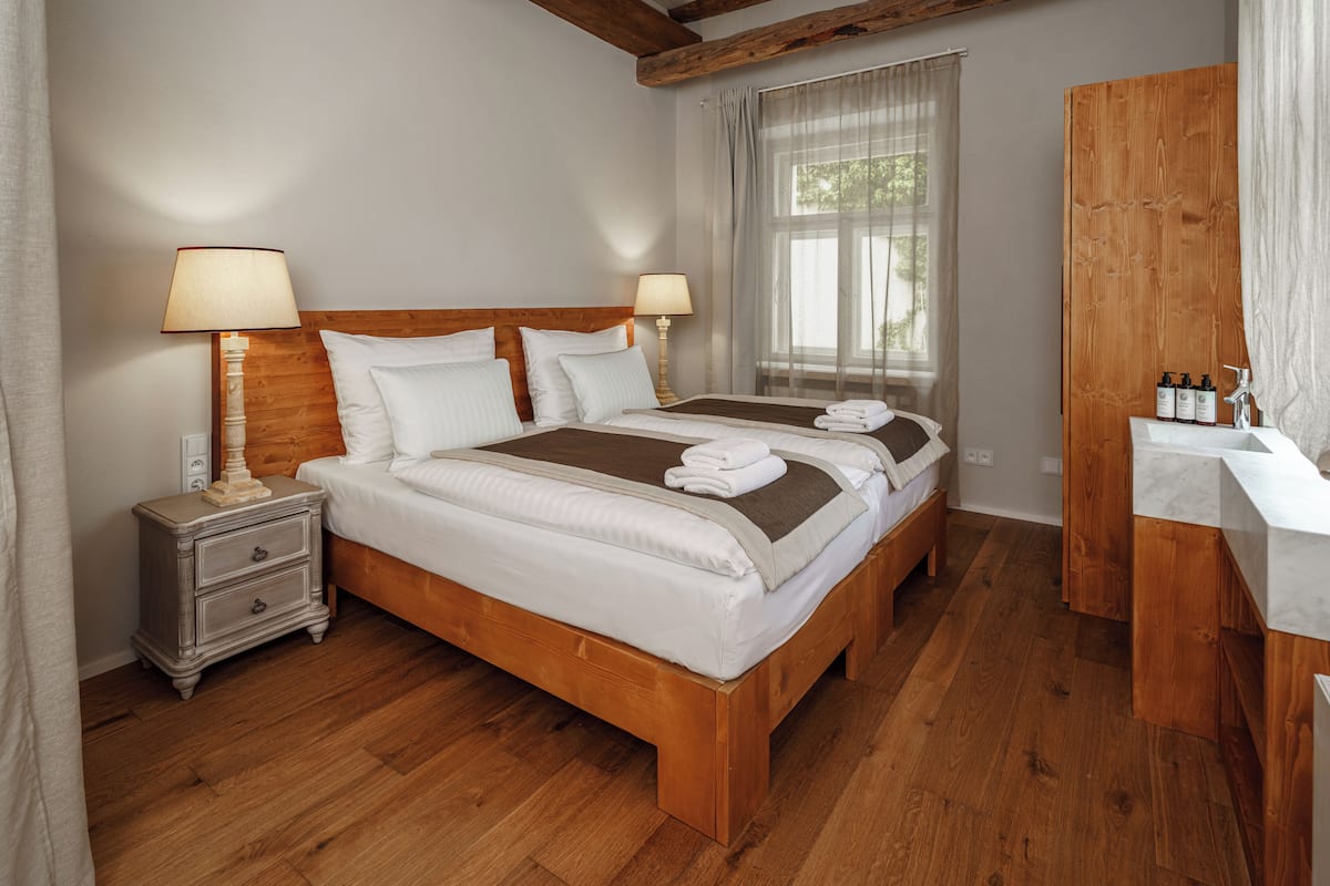 Deluxe Room | Premium bedding, in-room safe, desk, free cots/infant beds