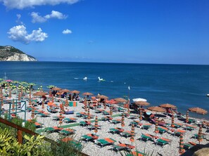 On the beach, sun-loungers - Very nice TWO-ROOM APARTMENT by the sea in Mattinata Gargano, ideal for a couple (Mattinata)