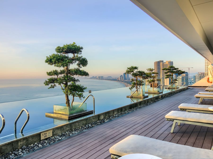 Outdoor pool, open 6:00 AM to 9:00 PM, sun loungers