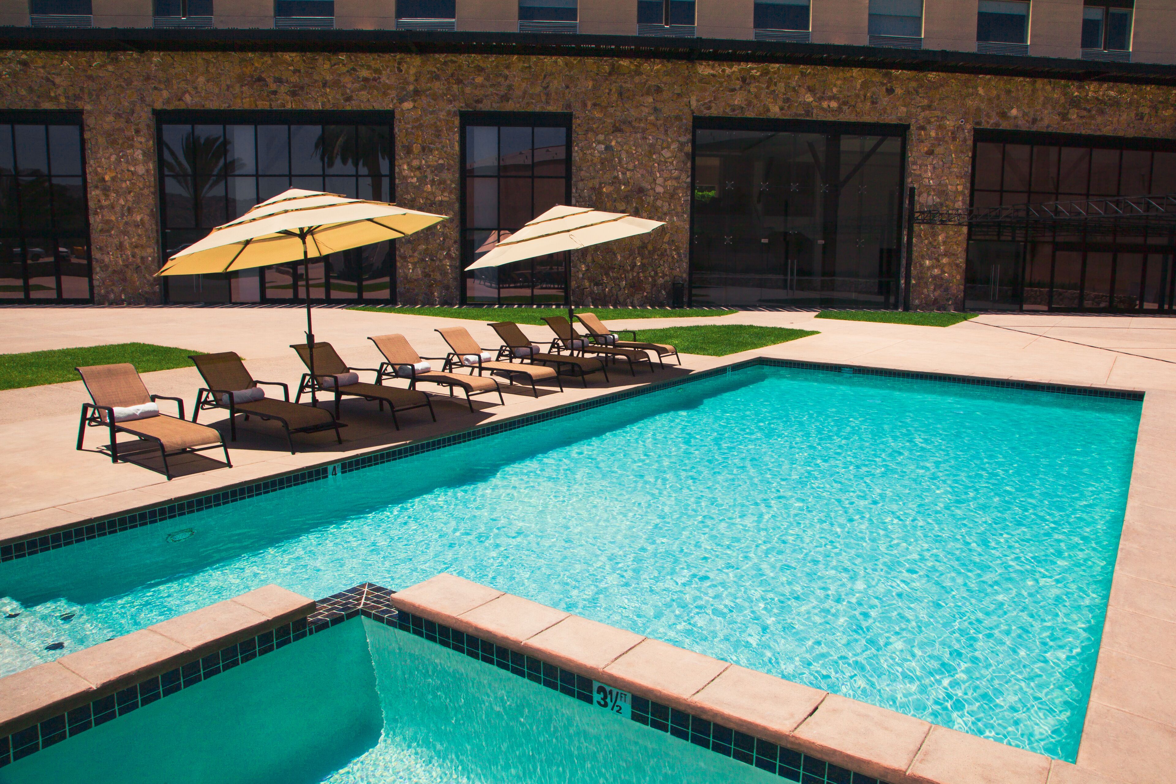 outdoor pool, free pool cabanas, pool umbrellas