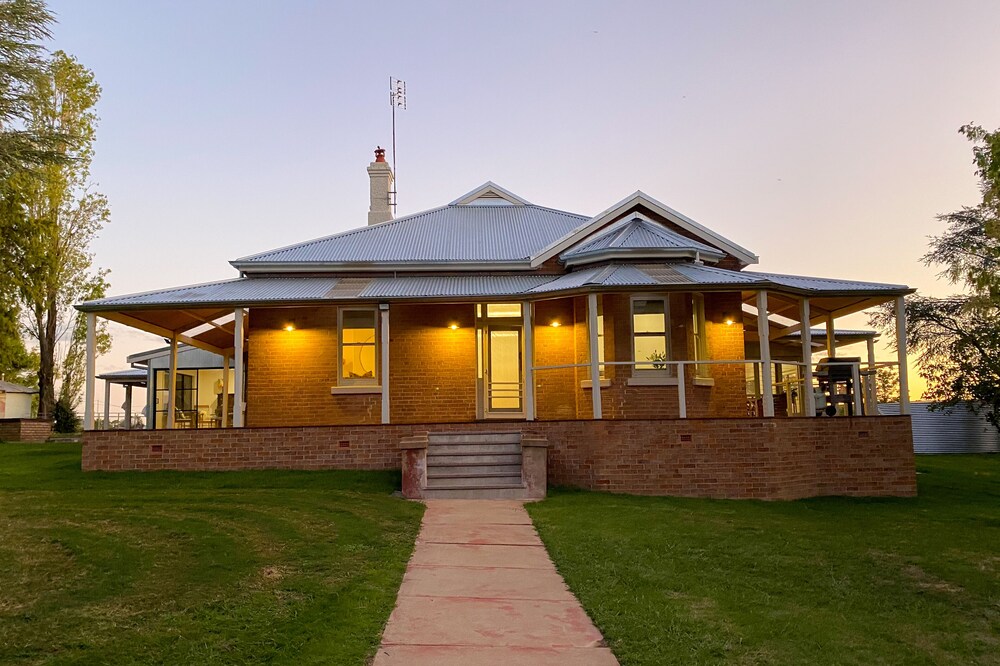 Hilton Homestead, Mandurama, set in a large country garden on a working farm.