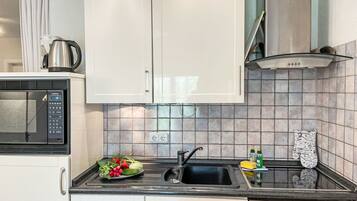 Réfrigérateur, four, lave-vaisselle, grille-pain