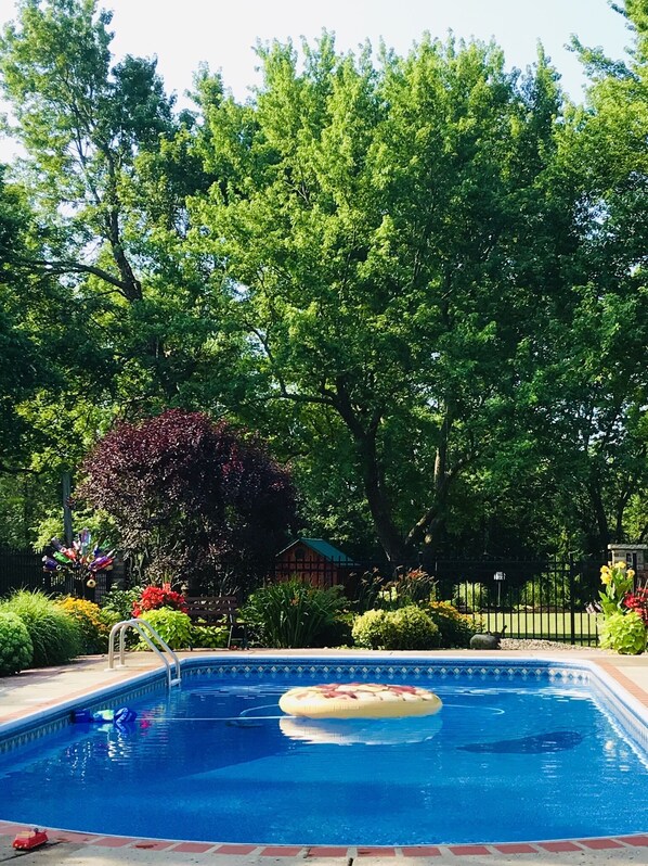 Outdoor pool, a heated pool - Carols Country Inn  Buffalo,NY (Alden)