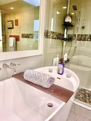 Bathtub, hair dryer, towels, soap
