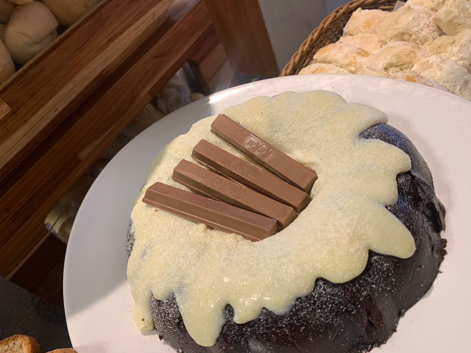 A dessert with chocolate pieces on top.