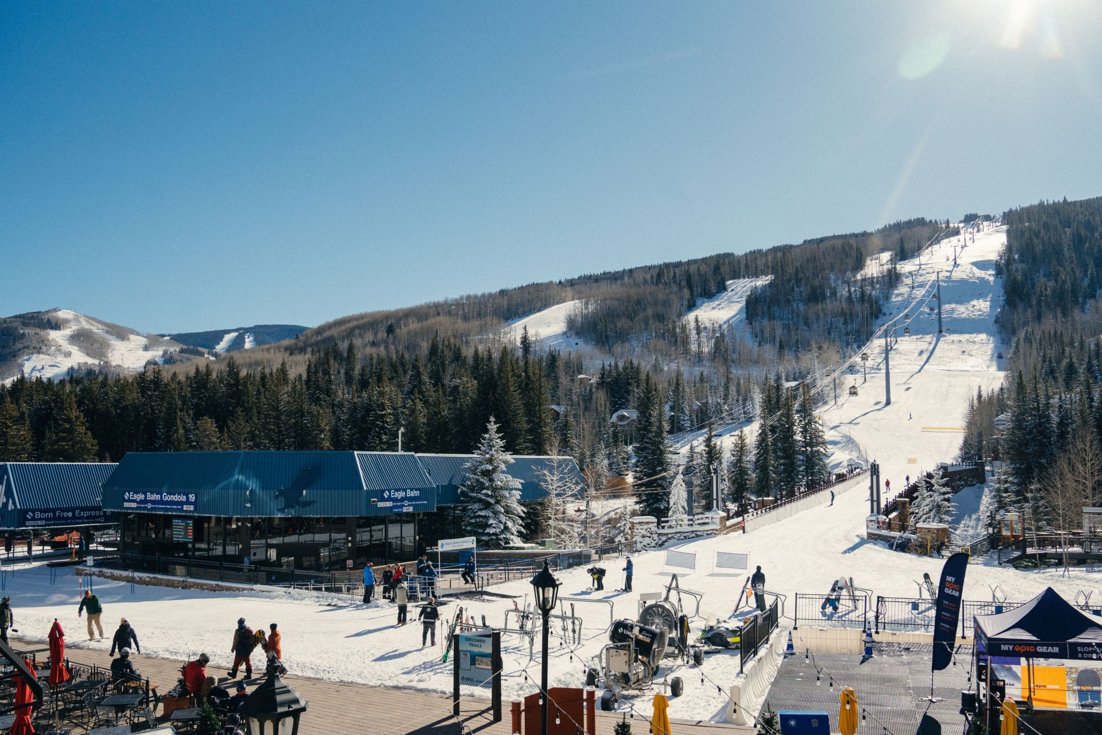 A ski resort with a chairlift, groomed trails, and a building labeled 'Eagle Bahn Gondola 19'.