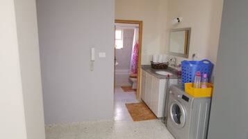 Combined shower/bathtub, hair dryer, towels, soap