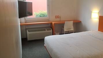 Cortinas blackout, ferros/tábuas de passar roupa, Wi-Fi de cortesia