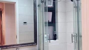 Shower, free toiletries, hair dryer, slippers