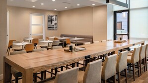 A modern conference room with a long table, multiple chairs, and a sofa. - Residence Inn by Marriott Walnut Creek (Walnut Creek)