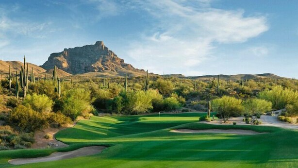 A golf course with a mountain in the background. - Brand New Luxury 5BR | Pool, Hot Tub & Mini Golf (Mesa)